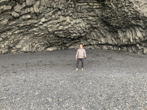 South Coast of Iceland. Inside basalt column cave at the Black sand beach